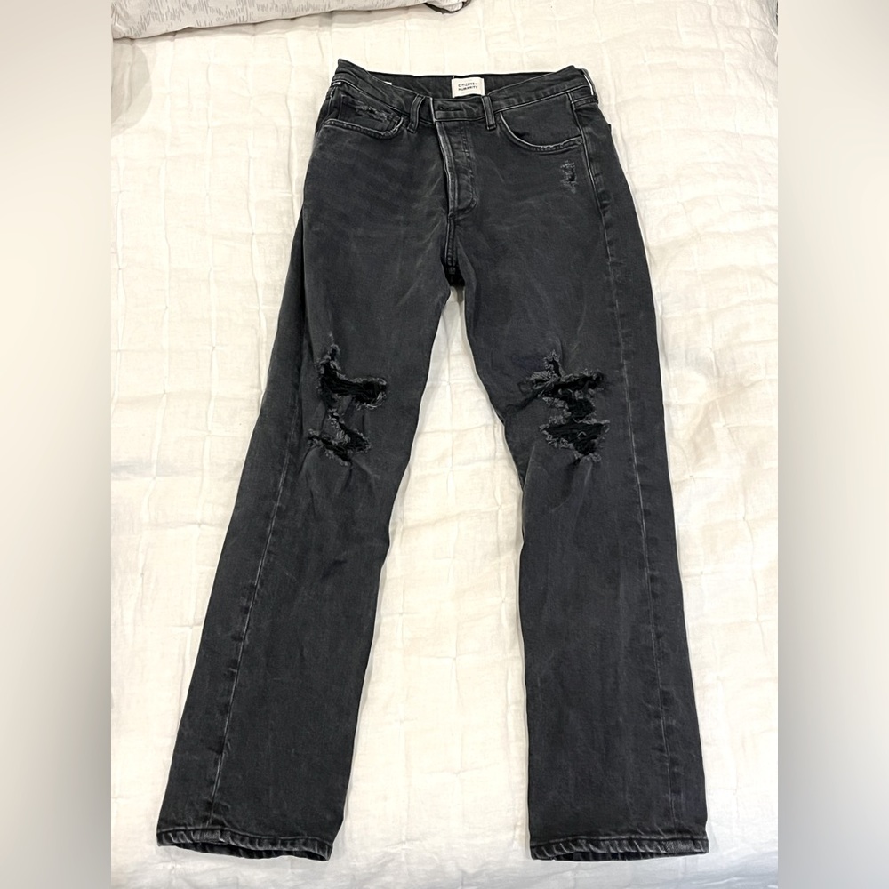 Black ripped jeans.